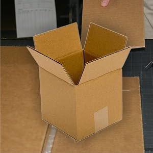 Open corrugated cardboard box used for packaging, storage, and shipping solutions in Giza.
