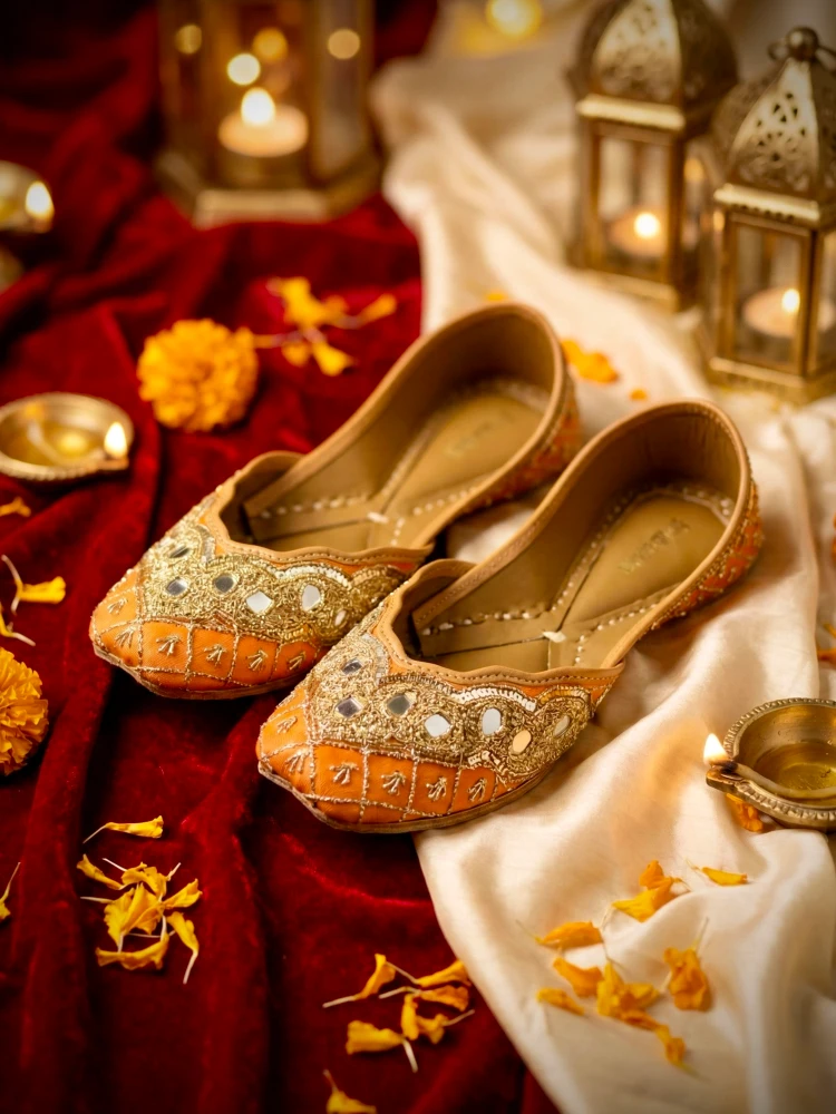 Gulbhahar bridal juttis with intricate embroidery and elegant embellishments for weddings and bridal wear.