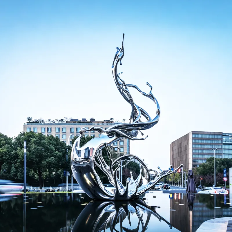 Mirror polished stainless steel sculpture in a public park